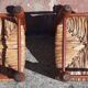 Pair of low armchairs by the fireplace. (Straw seat)