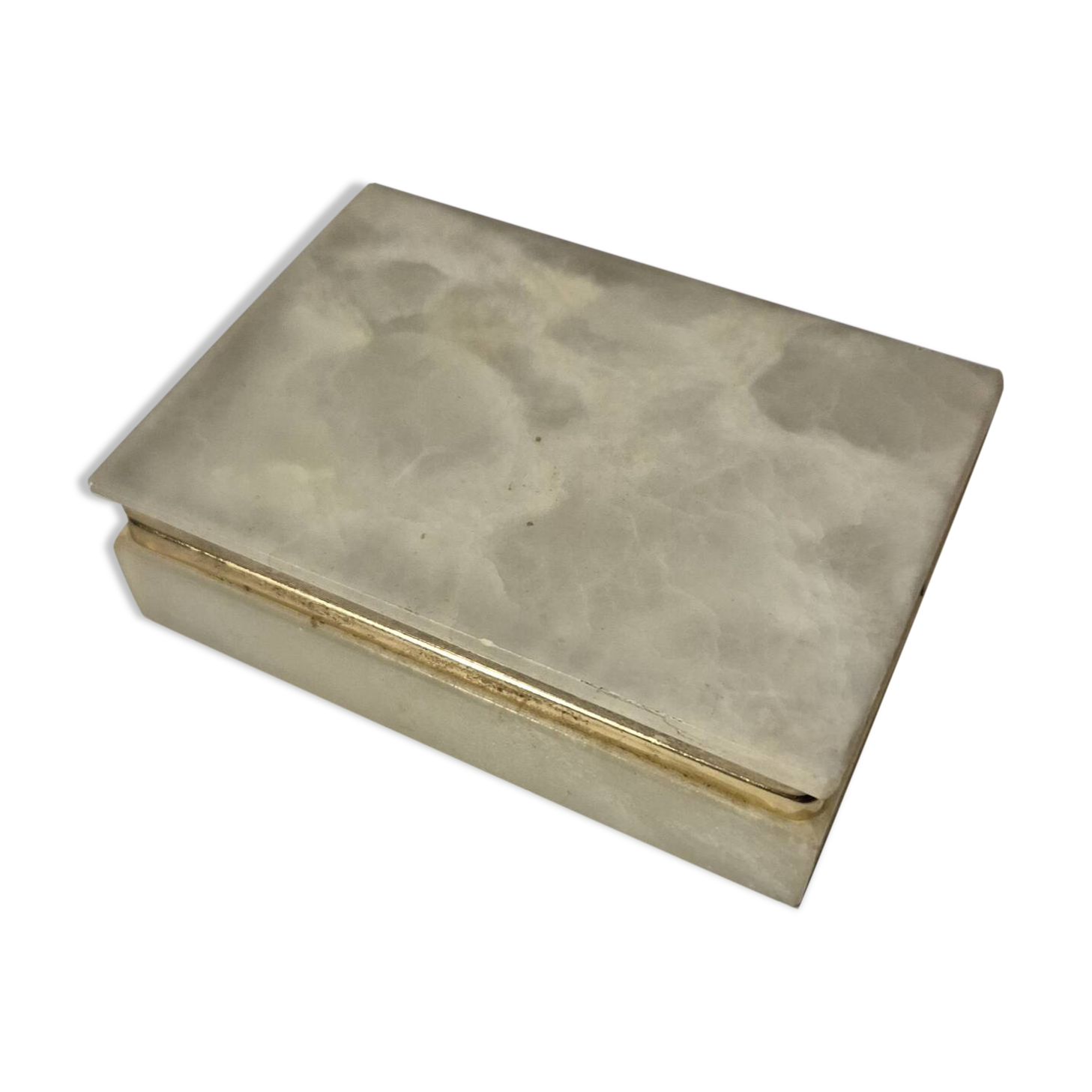 Rectangular light onyx jewellery box with brass trim, empty.