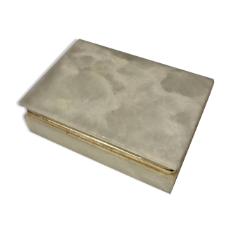 Rectangular light onyx jewellery box with brass trim, empty.