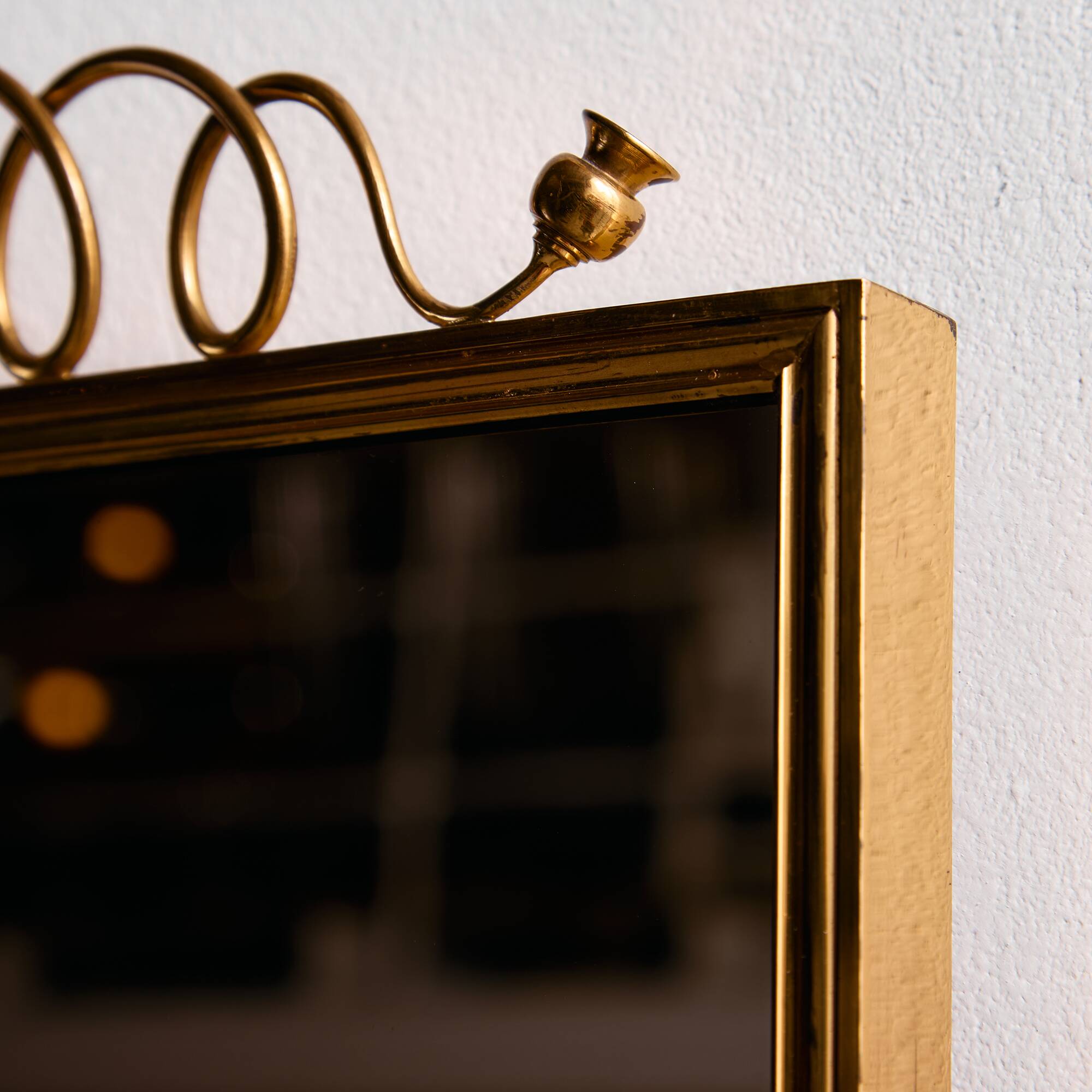 Metal and brass framed mirror