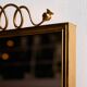 Metal and brass framed mirror