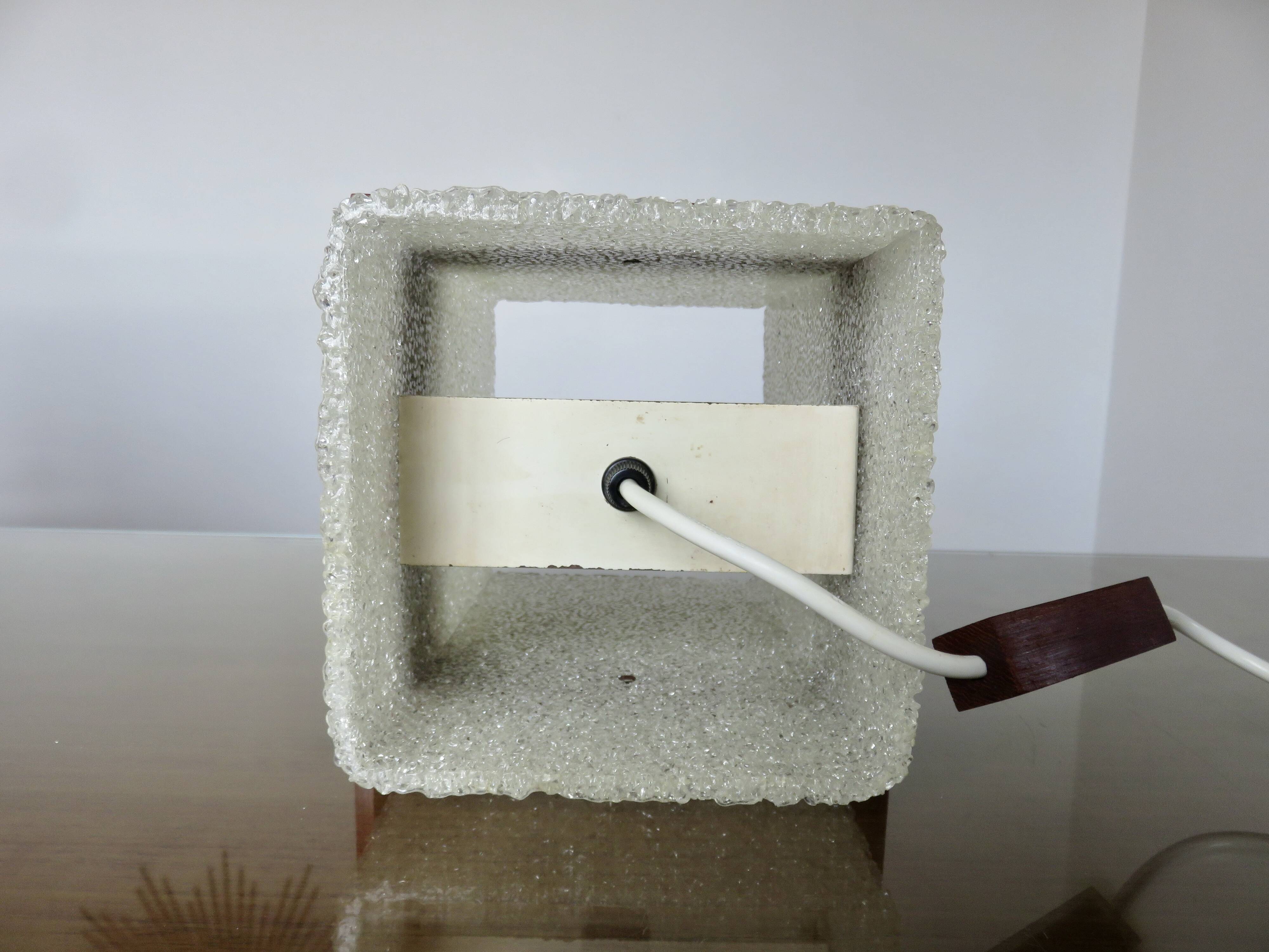 Pair of Scandinavian pendant lights in teak and perspex, 1970s.