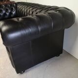 Black leather chesterfield sofa