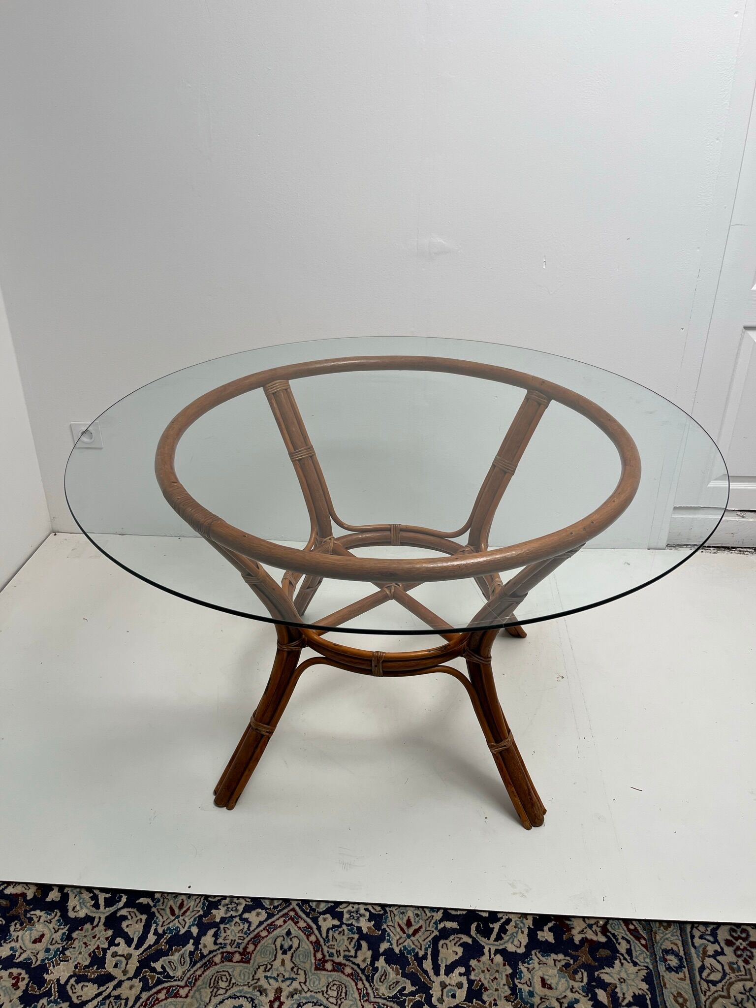 Vintage glass top rattan dining table