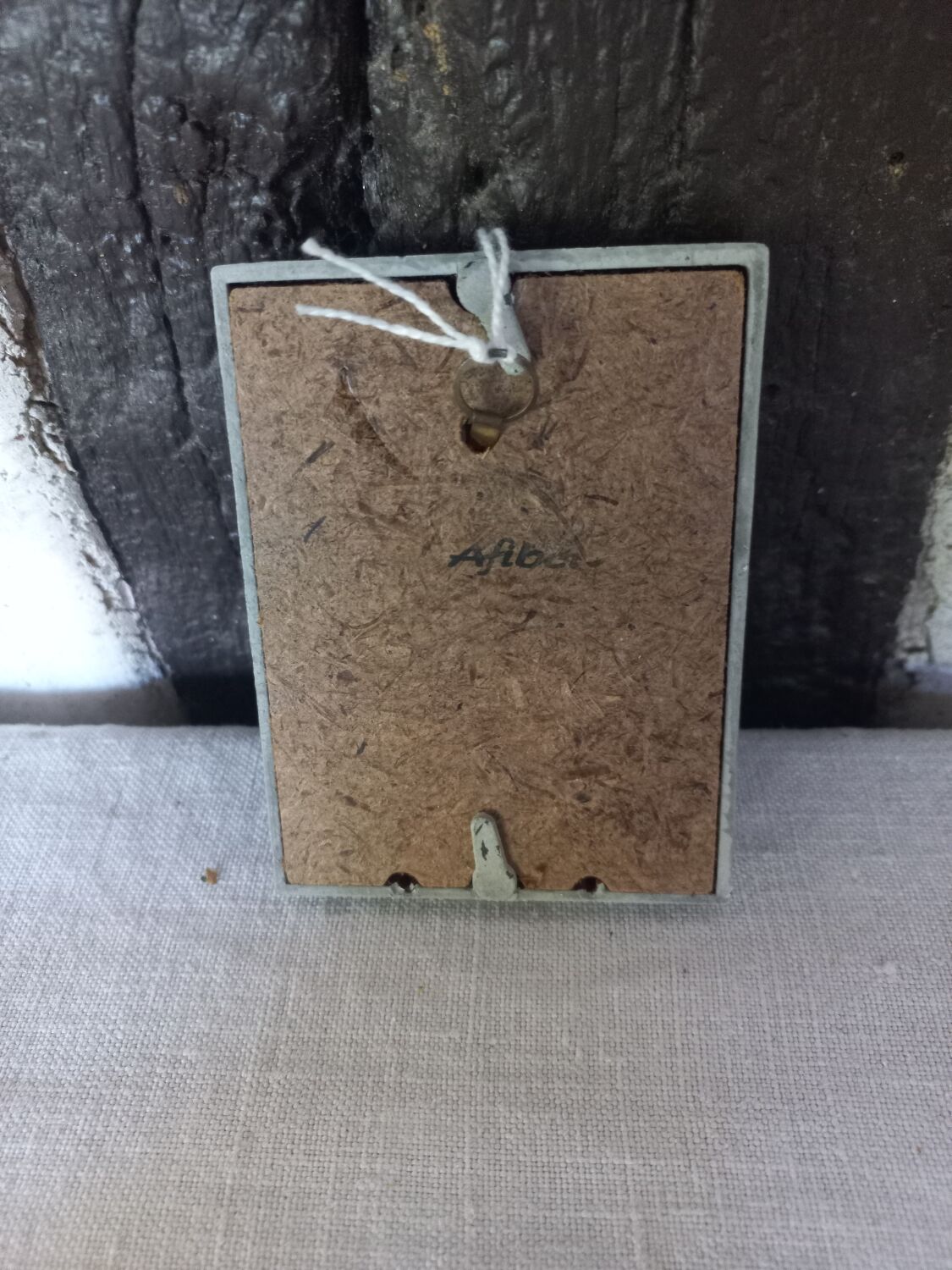 Small patinated photo frame