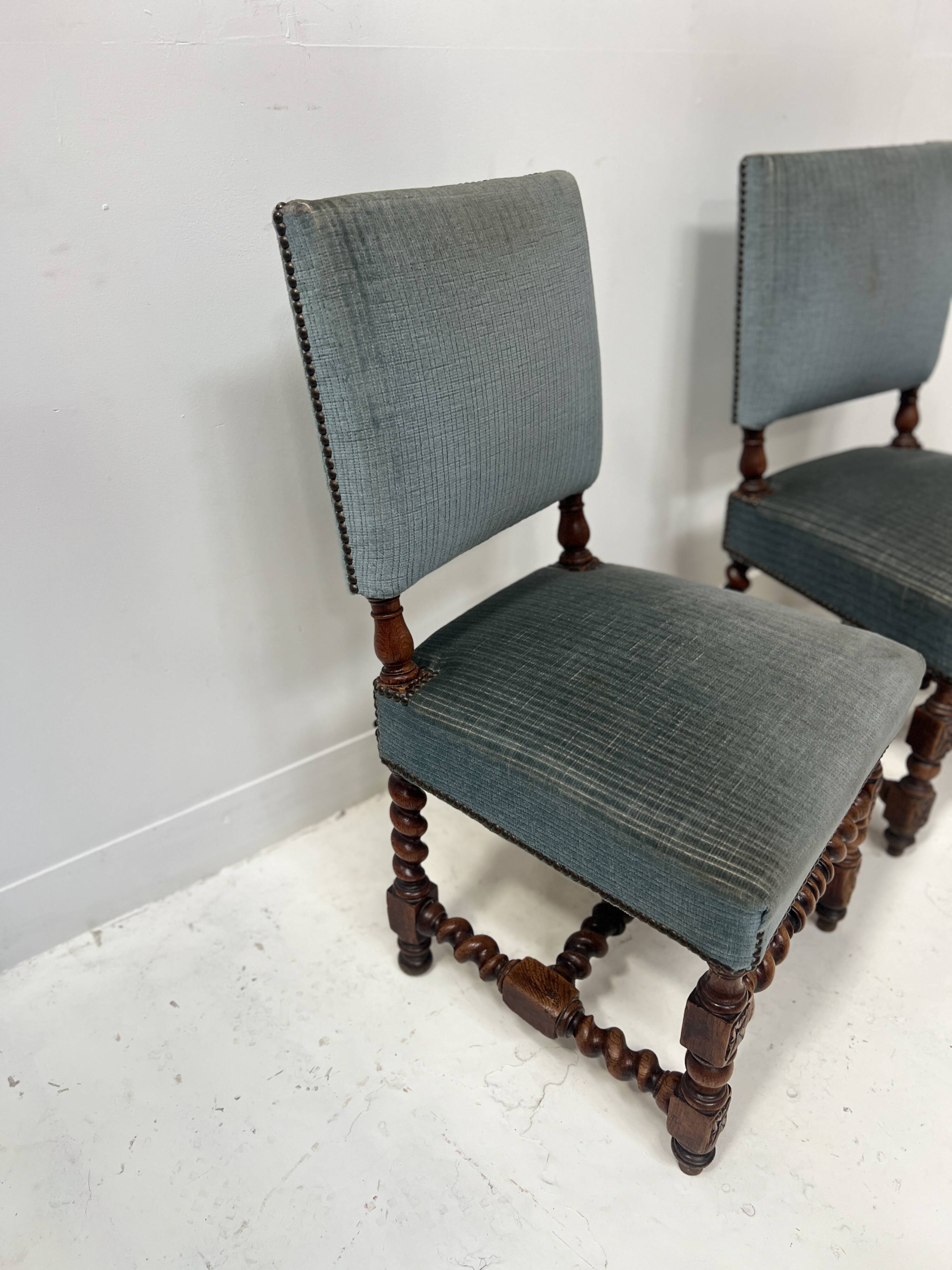 Pair of Louis XIII style twisted oak chairs from the 19th century.