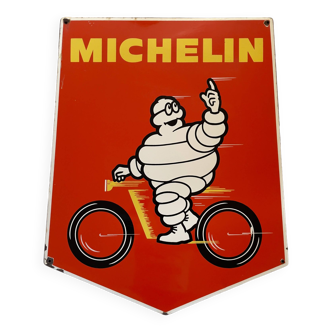 Superbe enseigne michelin pour pneus de vélo avec le bibendum au guidon