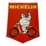 Superbe enseigne michelin pour pneus de vélo avec le bibendum au guidon