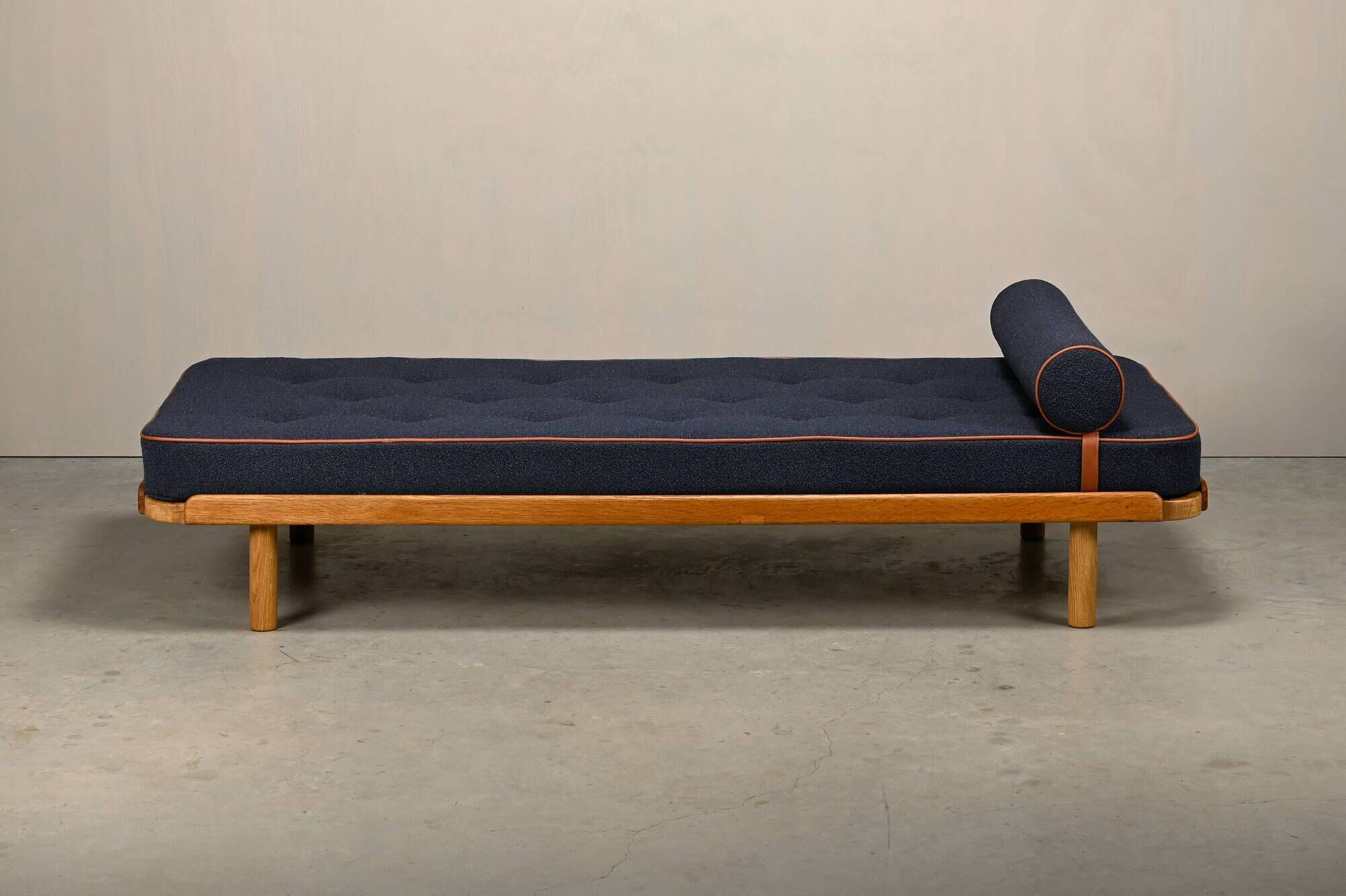 Scandinavian Daybed in Oak and dark Blue bouclé fabric with Leather accents