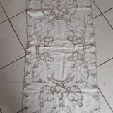 Rectangular linen tablecloth and handmade embroidery.