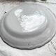 Antique French Earthenware Plate from the 19th century with small blue flower motif