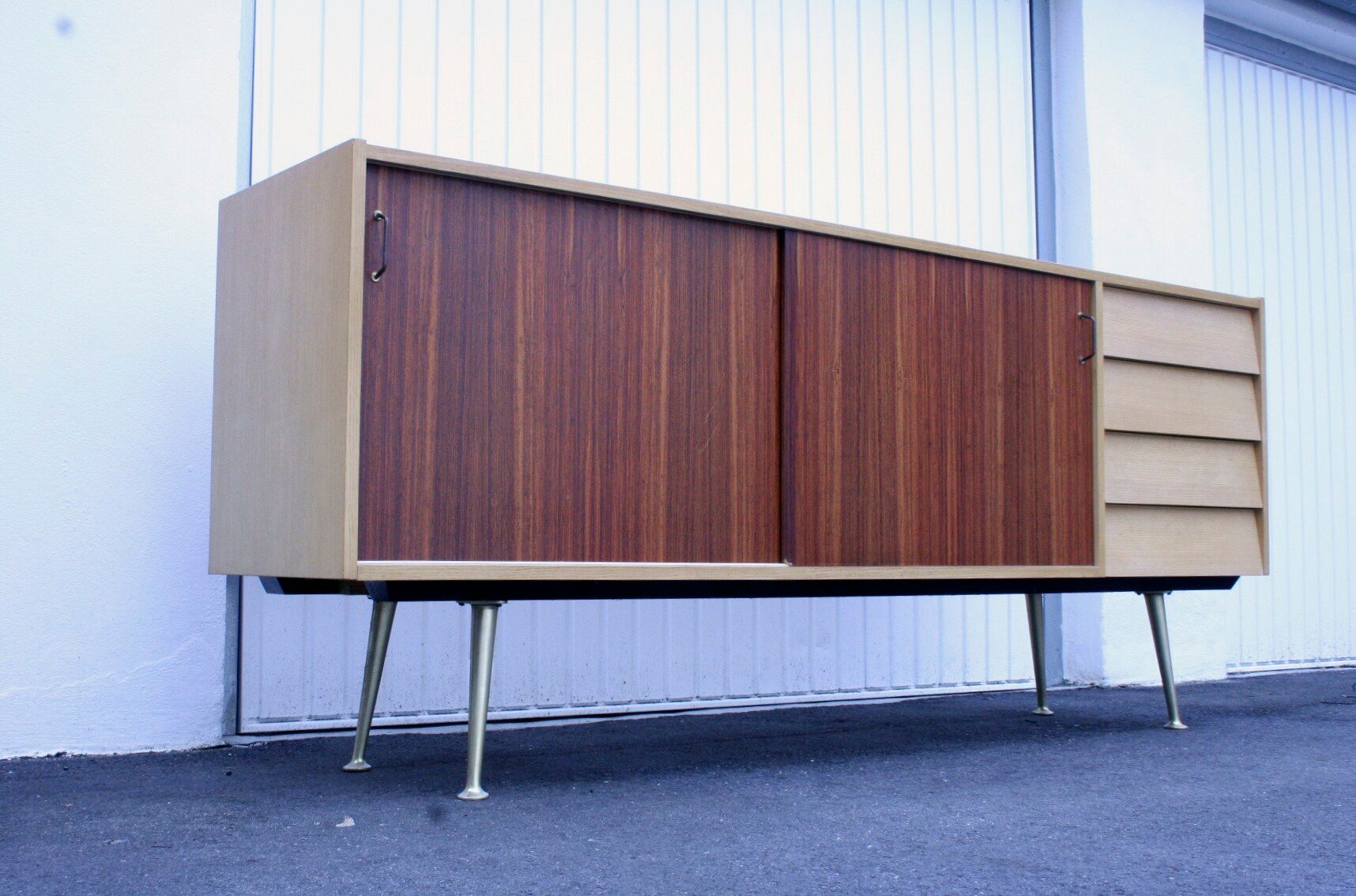 Midcentury sideboard with brass legs