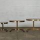 Superb trundle table round golden and smoked glass