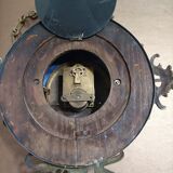 Wall clock in glazed earthenware decoration and brass chain empire style