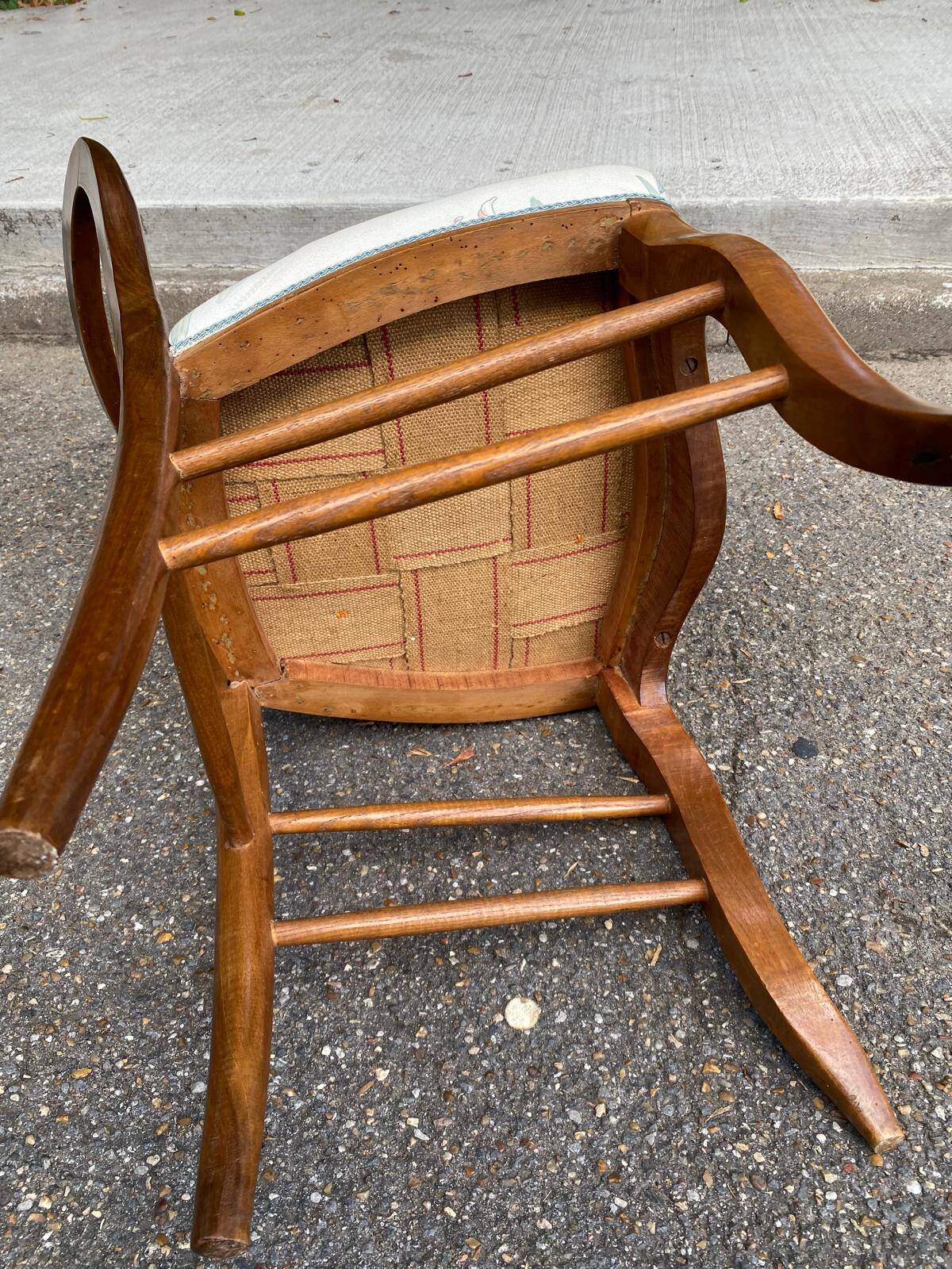 Antique flying chair in Restoration / Louis-Philippe style made of solid wood.