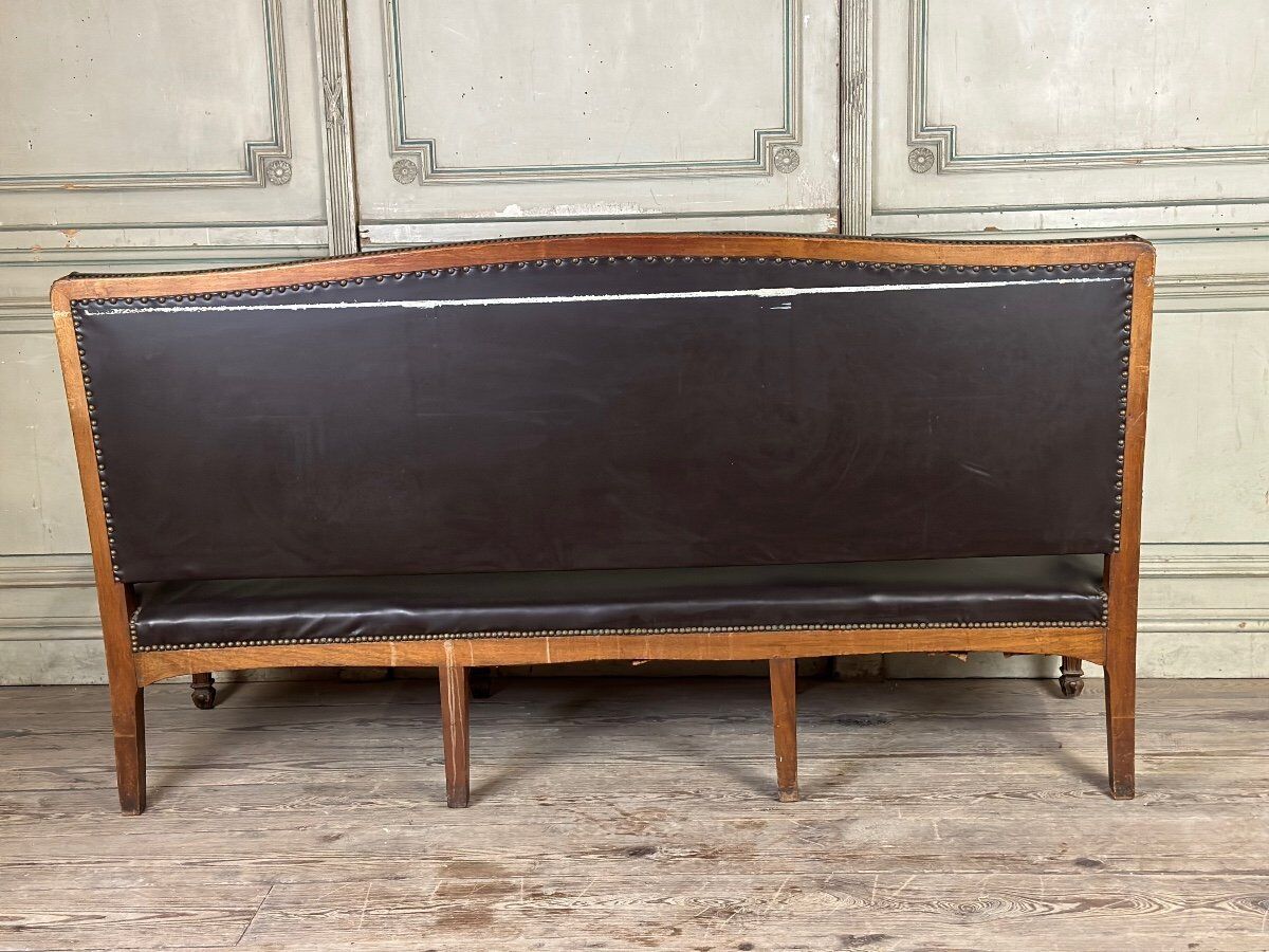Napoleon III style bench in carved walnut, synthetic leather circa 1880