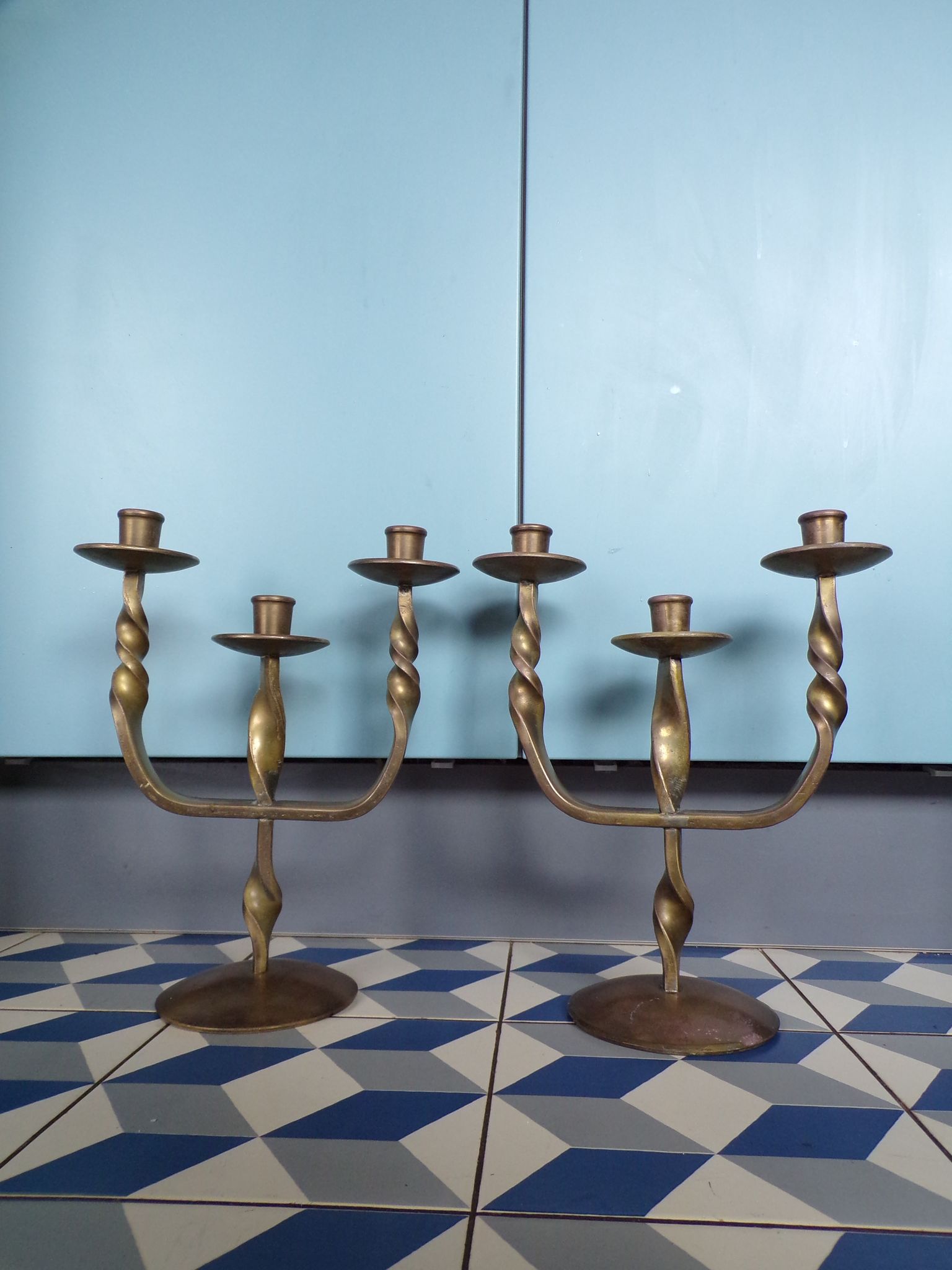 Pair of brutalist bronze candle holders