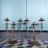 Pair of brutalist bronze candle holders