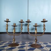 Pair of brutalist bronze candle holders