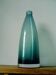 Designer vase in blue-green glass