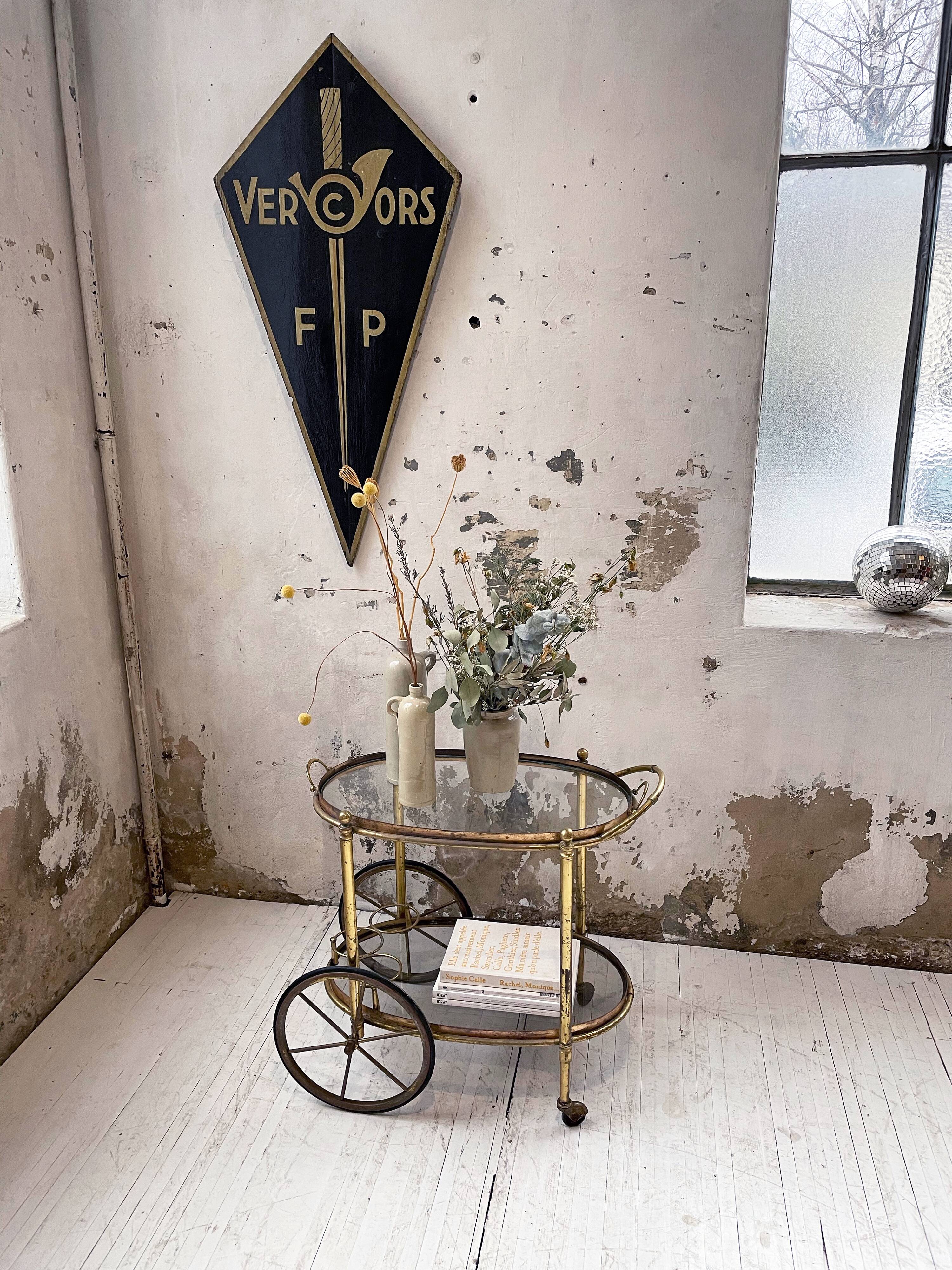 Cart serves brass bar