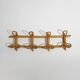 Wall coat rack in rattan and woven wicker, 1960s.