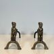 Pair of bronze andirons with seated shamans monogrammed Anton Prinner