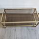 Table basse en laiton doré verre fumé design années 1970