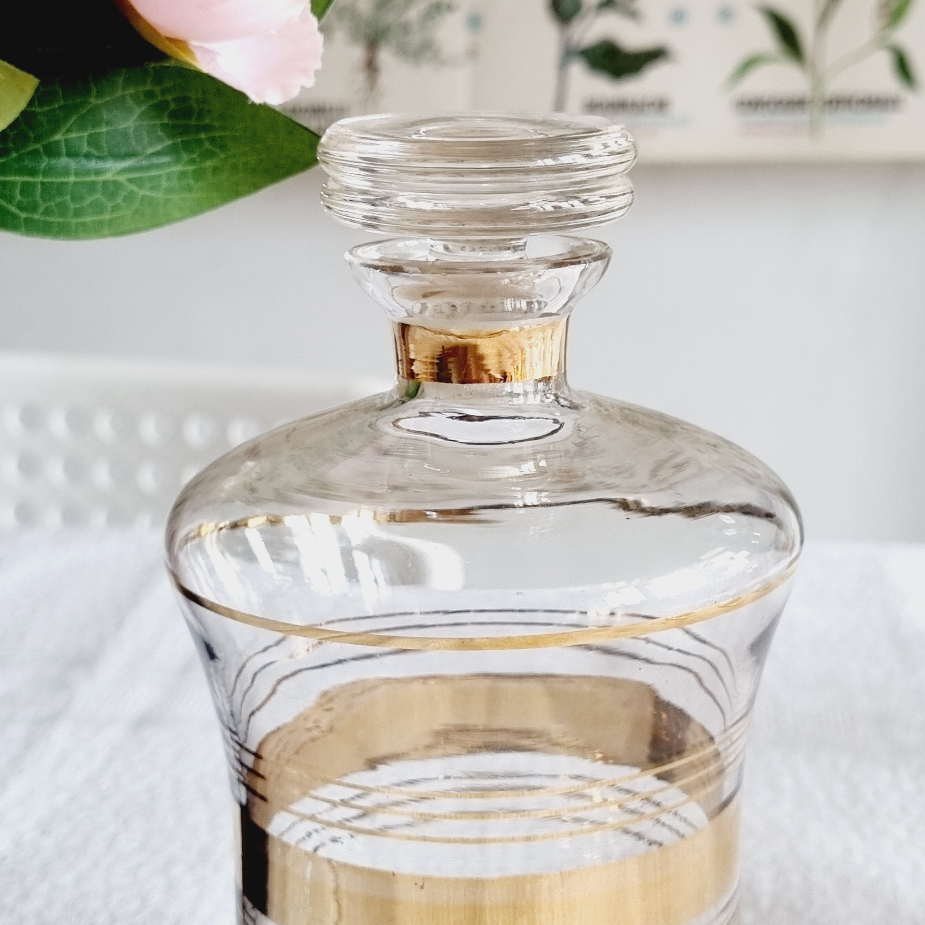 Blown glass decanter with golden borders