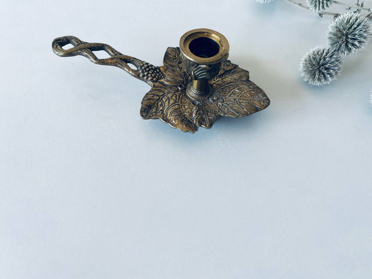 Cellar rat candle holder