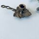 Cellar rat candle holder
