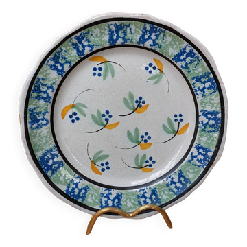Ancienne assiette à fleurs dit cul noir