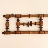 Vintage wooden wall coat rack with 4 swivel hooks from 1920
