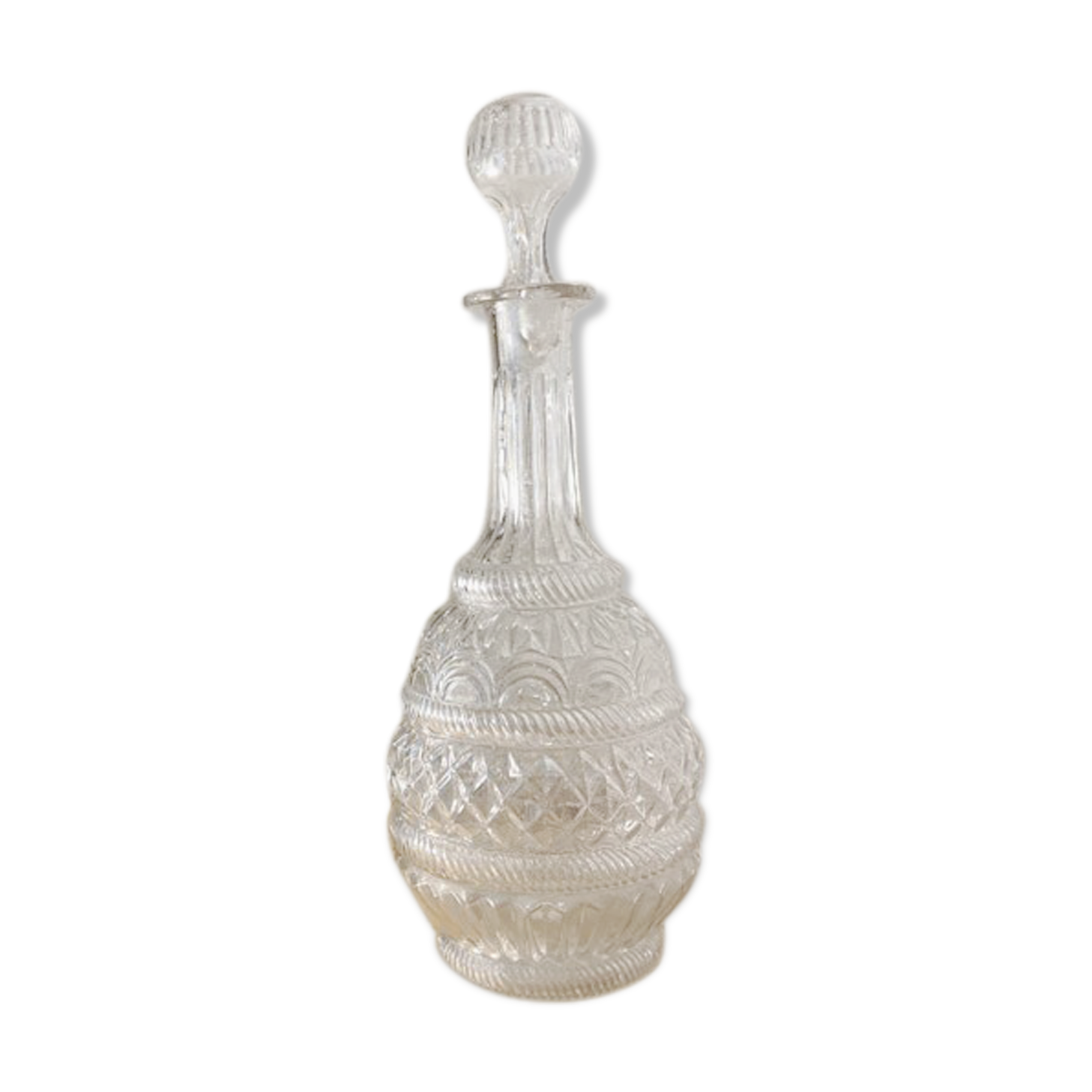 Large blown glass decanter and relief decoration