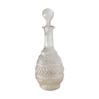 Large blown glass decanter and relief decoration