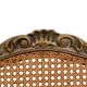 Paire de chaises d'appoint en canne de style Louis XV peintes en or et vert.