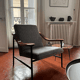 Armchair with walnut armrest