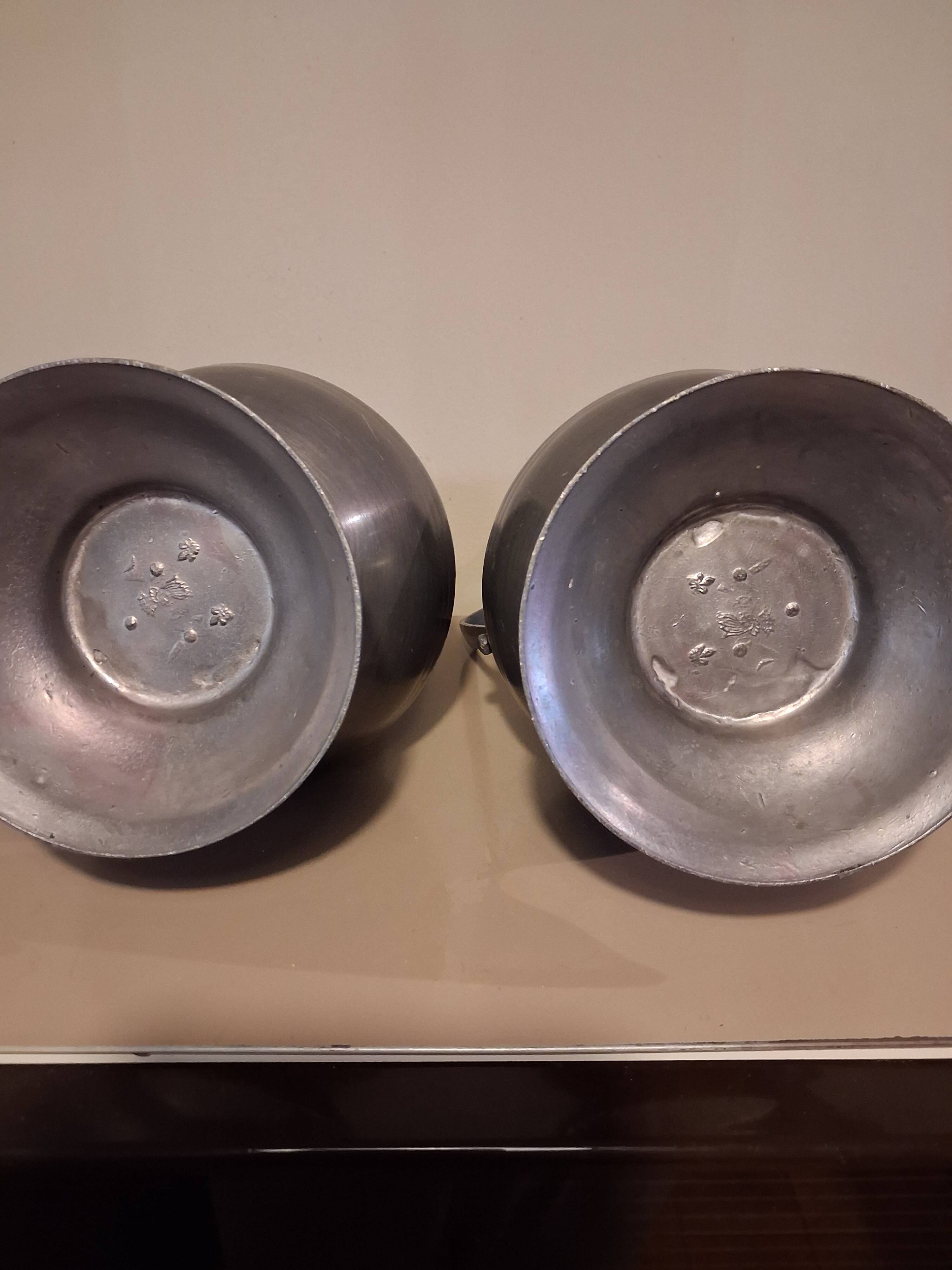 Large vintage pewter jugs