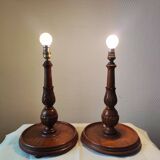 Pair of antique carved wooden lamps