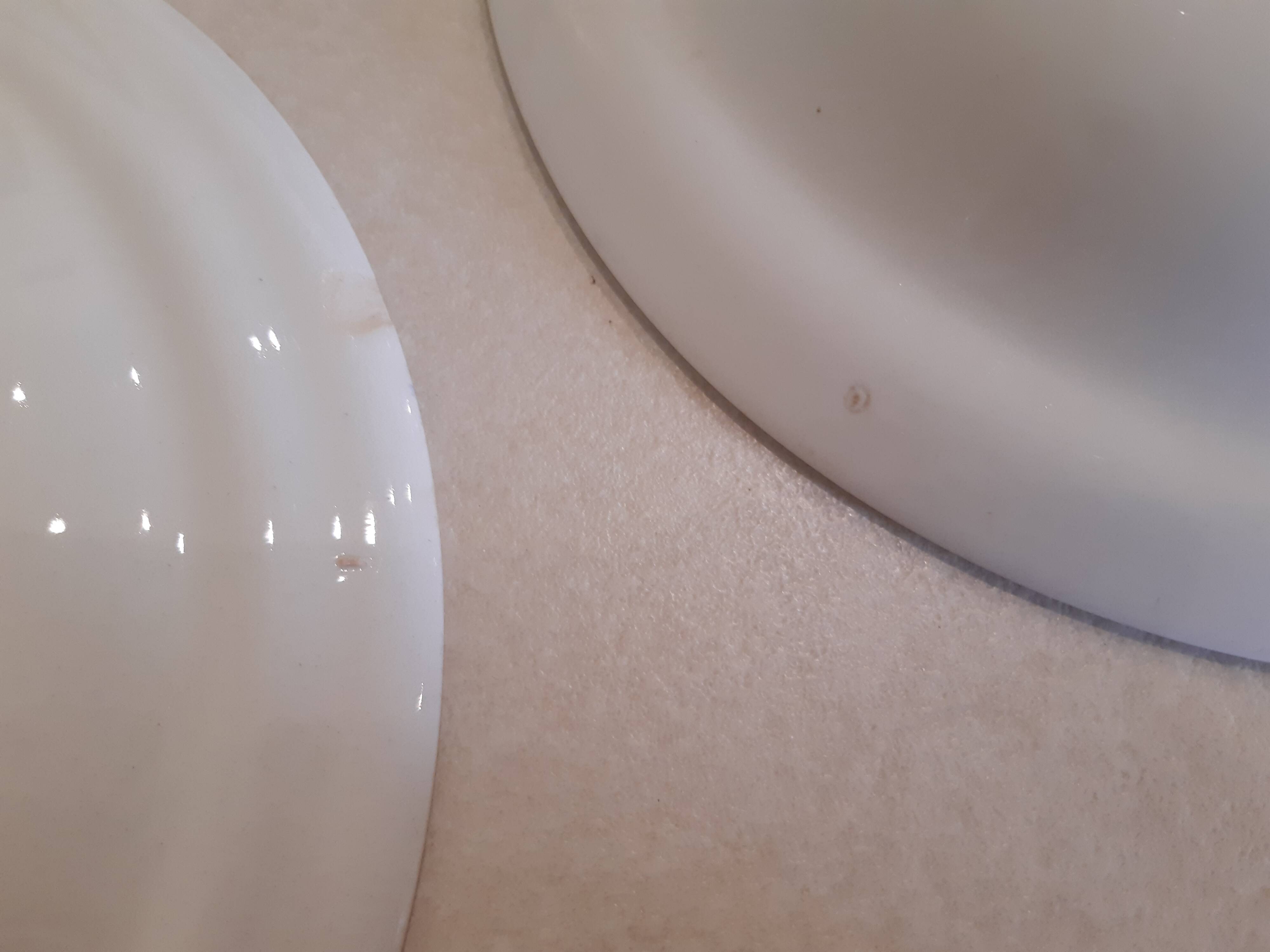 Set of two plates, flat and deep, with a country blue decoration.