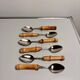 Set of 6 vintage dessert spoons with bamboo handles.