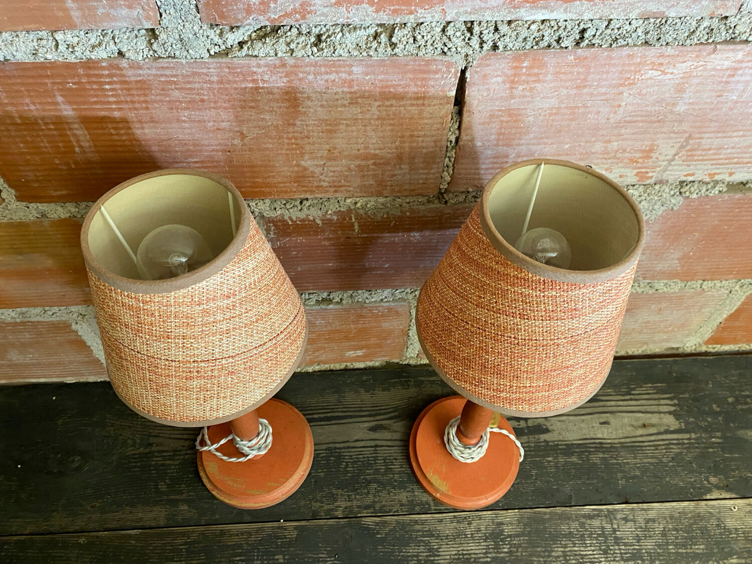 Pair of antique turned wood bedside lamps with push button switch