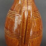 Mid-20th century brown glazed stoneware wine pitcher
