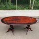 Glossy mahogany dining table in English Regency style from the 1970s.