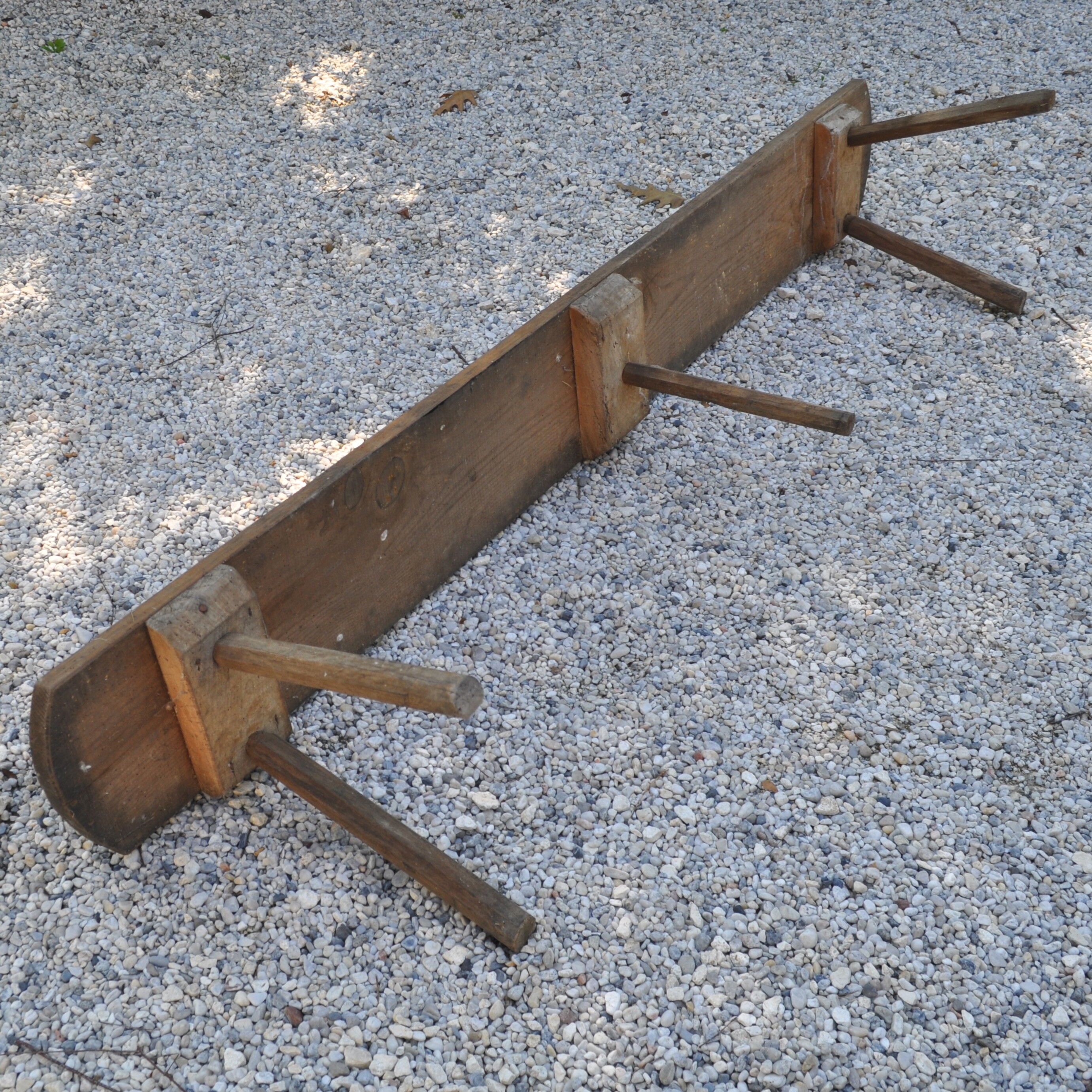 Rustic bench with central foot