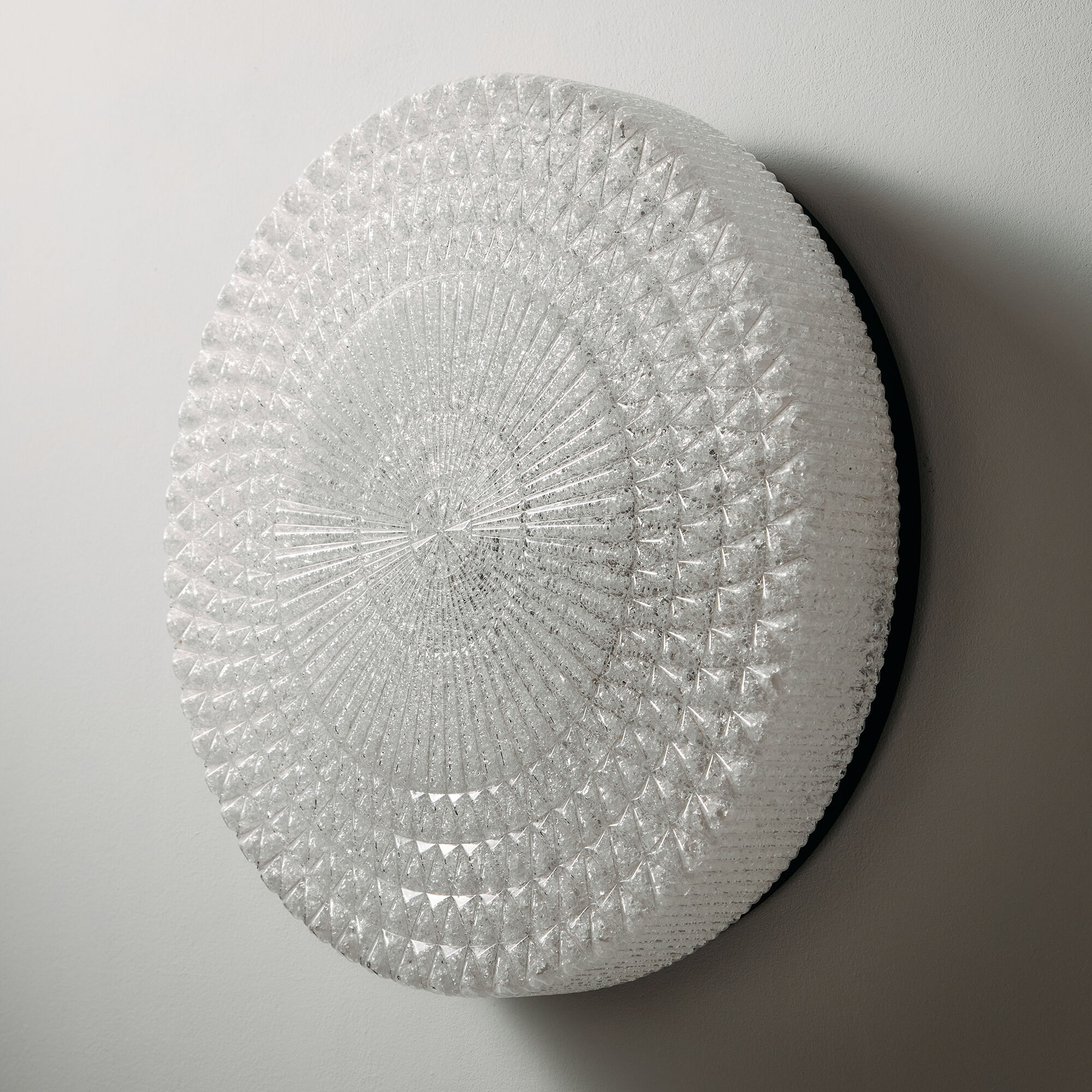 Applique murale en métal et plastique