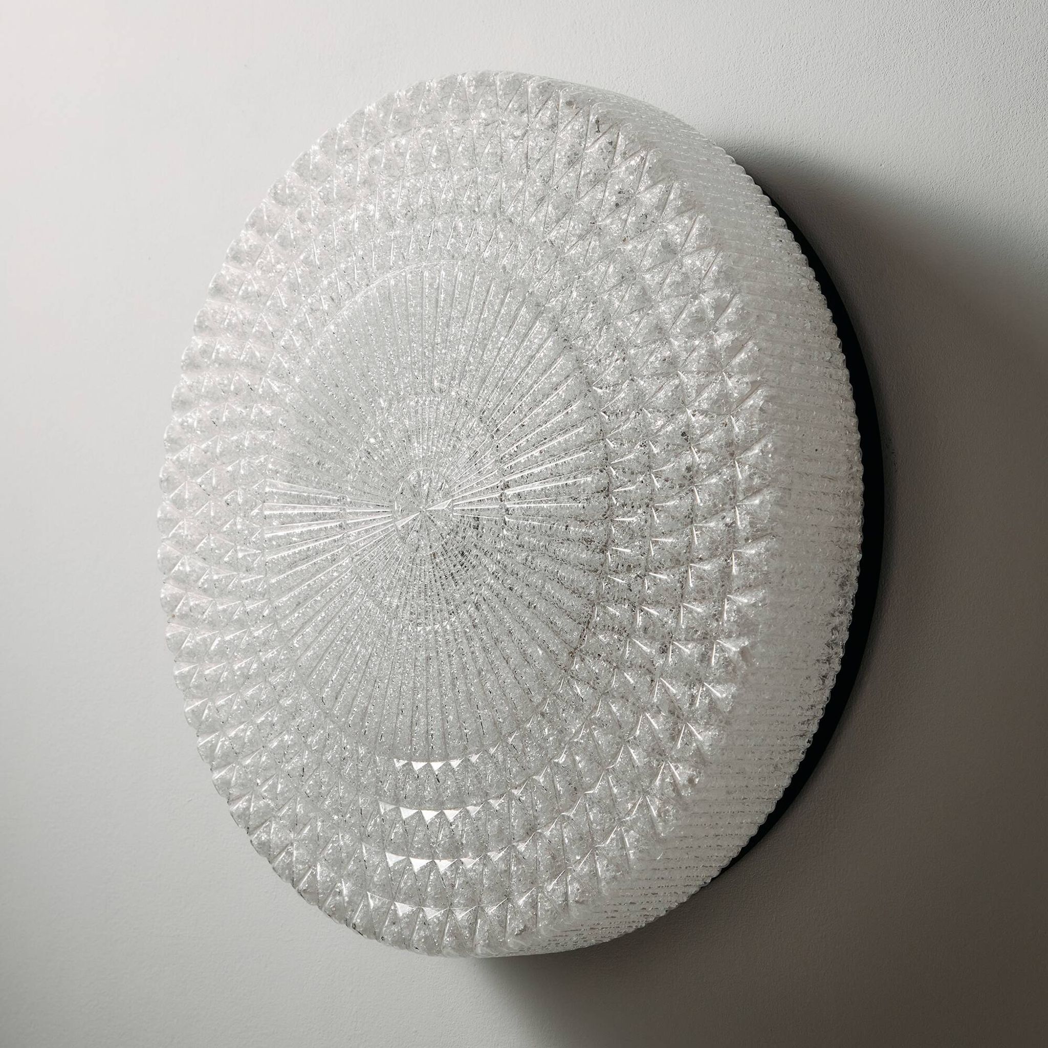 Wall light in metal and plastic