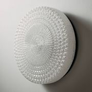 Wall light in metal and plastic