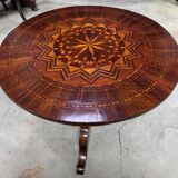 Charles X period gueridon in marquetry.