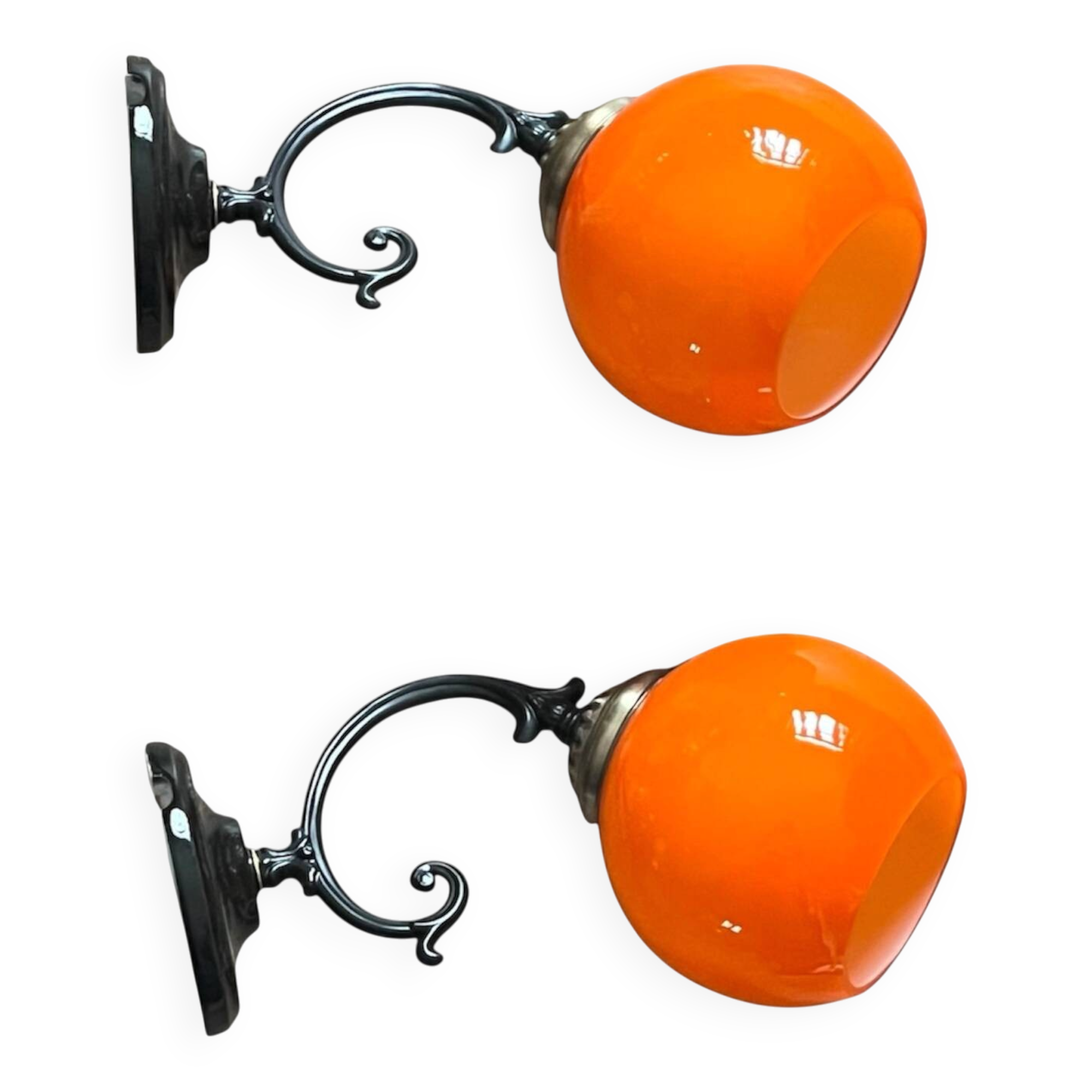 Pair of wall sconces with orange opaline globes and porcelain rose.